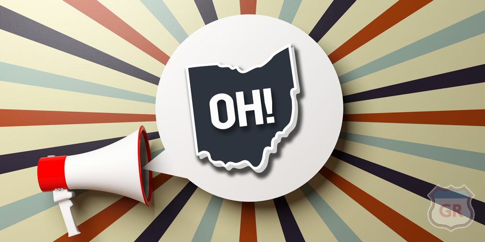 Megaphone empty bubble. Bullhorn and bubble on circus retro background, copy space. 3d illustration. inside the bubble is the shape of the state of Ohio with OH! written on it. Big News! Ohio Sports Betting to Kick Off on January 1, 2023