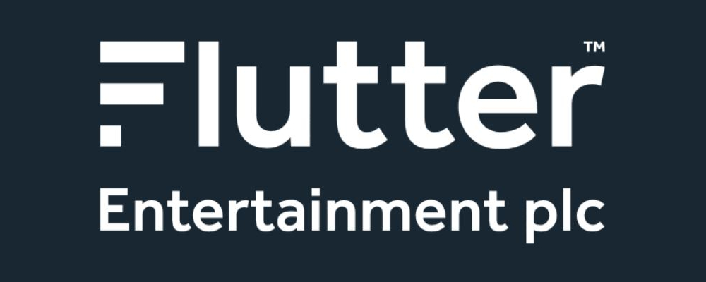 Flutter Entertainment plc logo is seen on a black background. The gaming conglomerate says it expects its US division (including FanDuel) to turn a profit in 2023. Also hopes to launch in new states as more jurisdictions legalize online sports betting.
